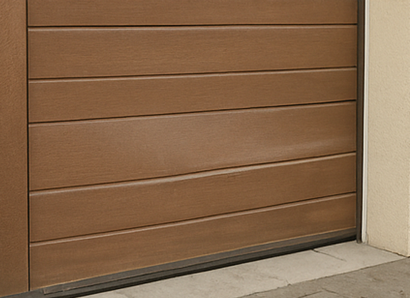 Overhead garage door stuck halfway, needing urgent realignment service